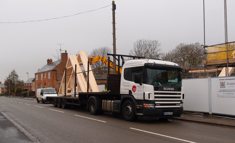Roof trusses arriving at a construction site in Great Gidding, January 2014